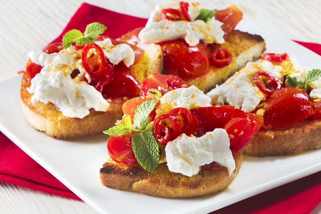 Bruschetta With Burrata And Semi Dried Datterino Tomatoes